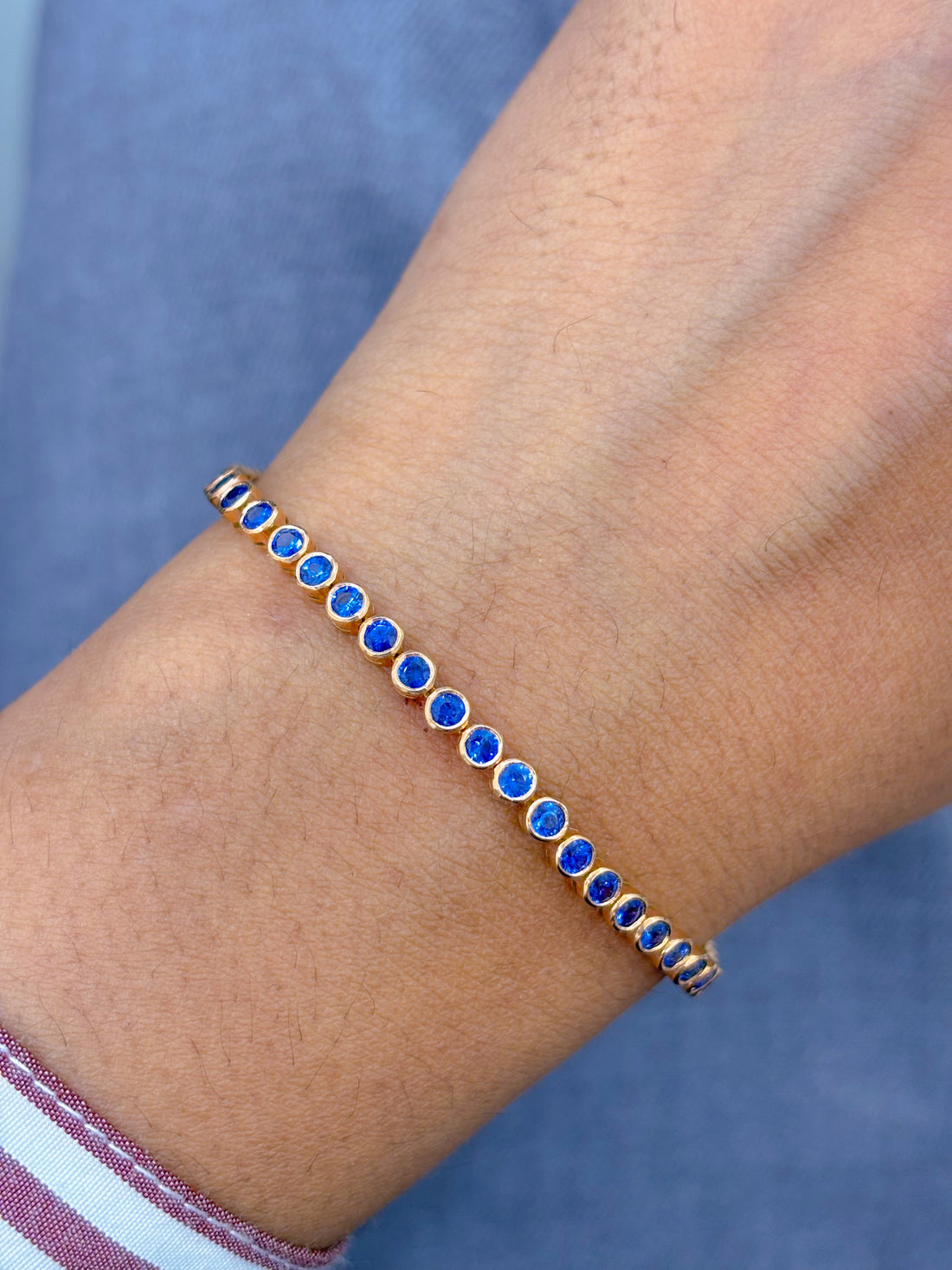 JPBRC-629/4472 Blue Sapphire Round 2.50Mm Bezal Rose Gold Bracelet | 18K