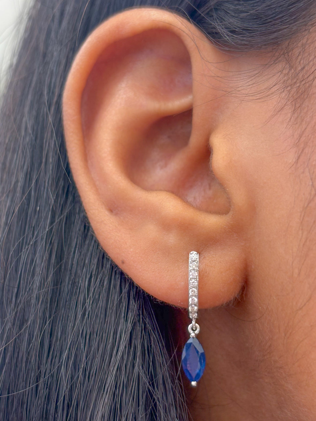 JPERG-2119/7749 Blue Sapphire Marquise Huggies Earring | 18K