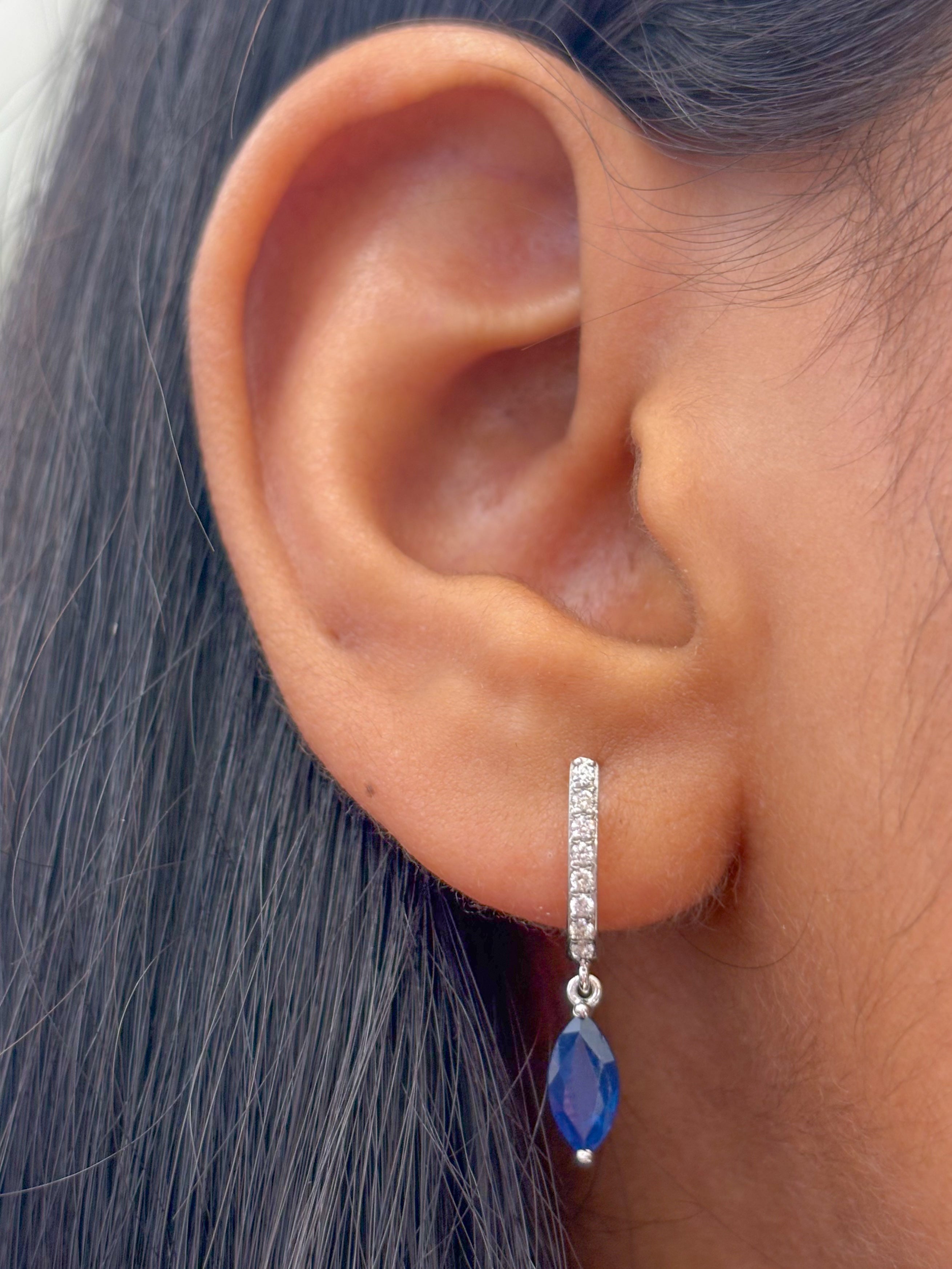 JPERG-2119/7749 Blue Sapphire Marquise Huggies Earring | 18K