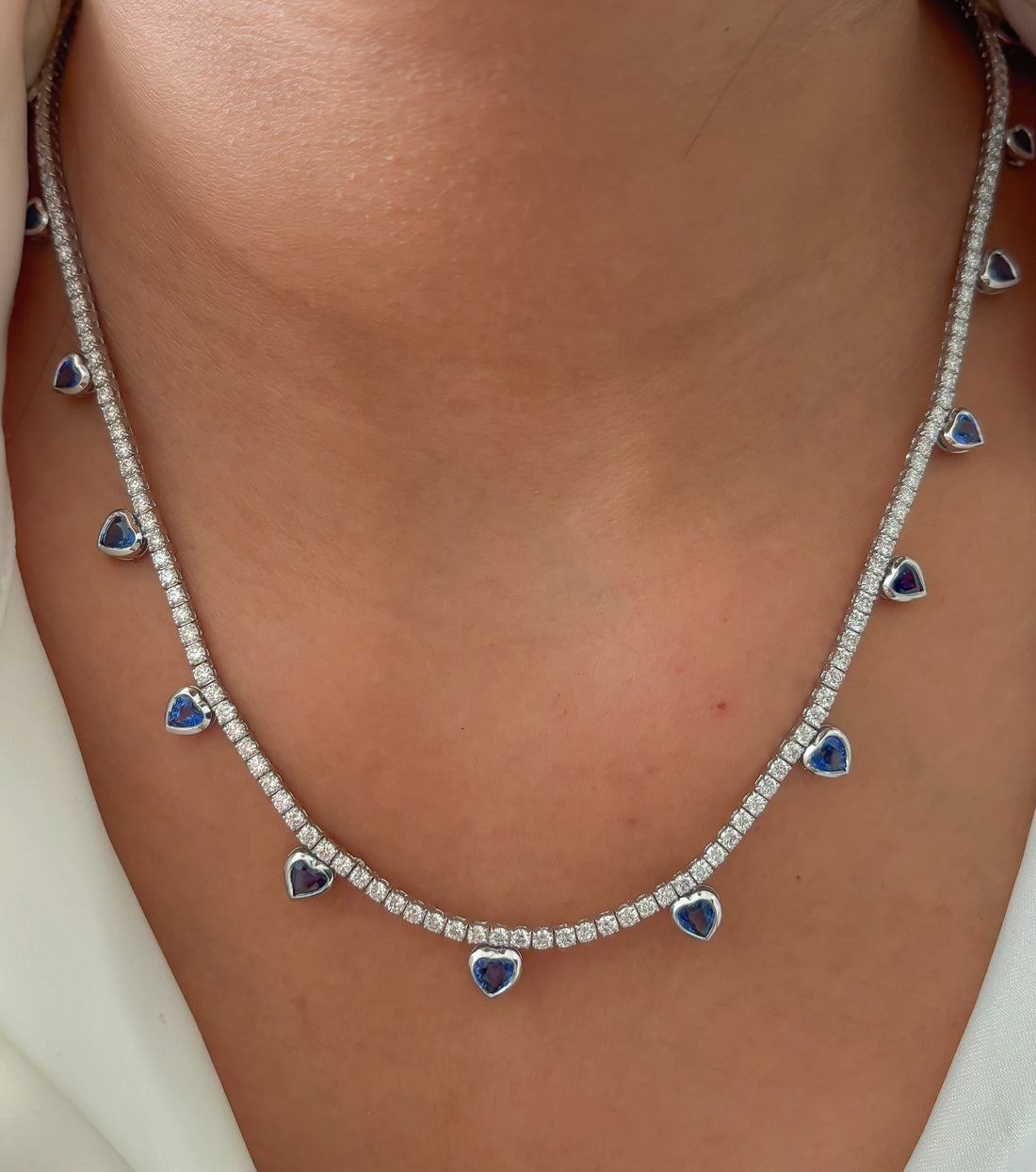 JPNC-491/6115 Blue Sapphire Heart Bezel Set Diamond Necklace | 18K