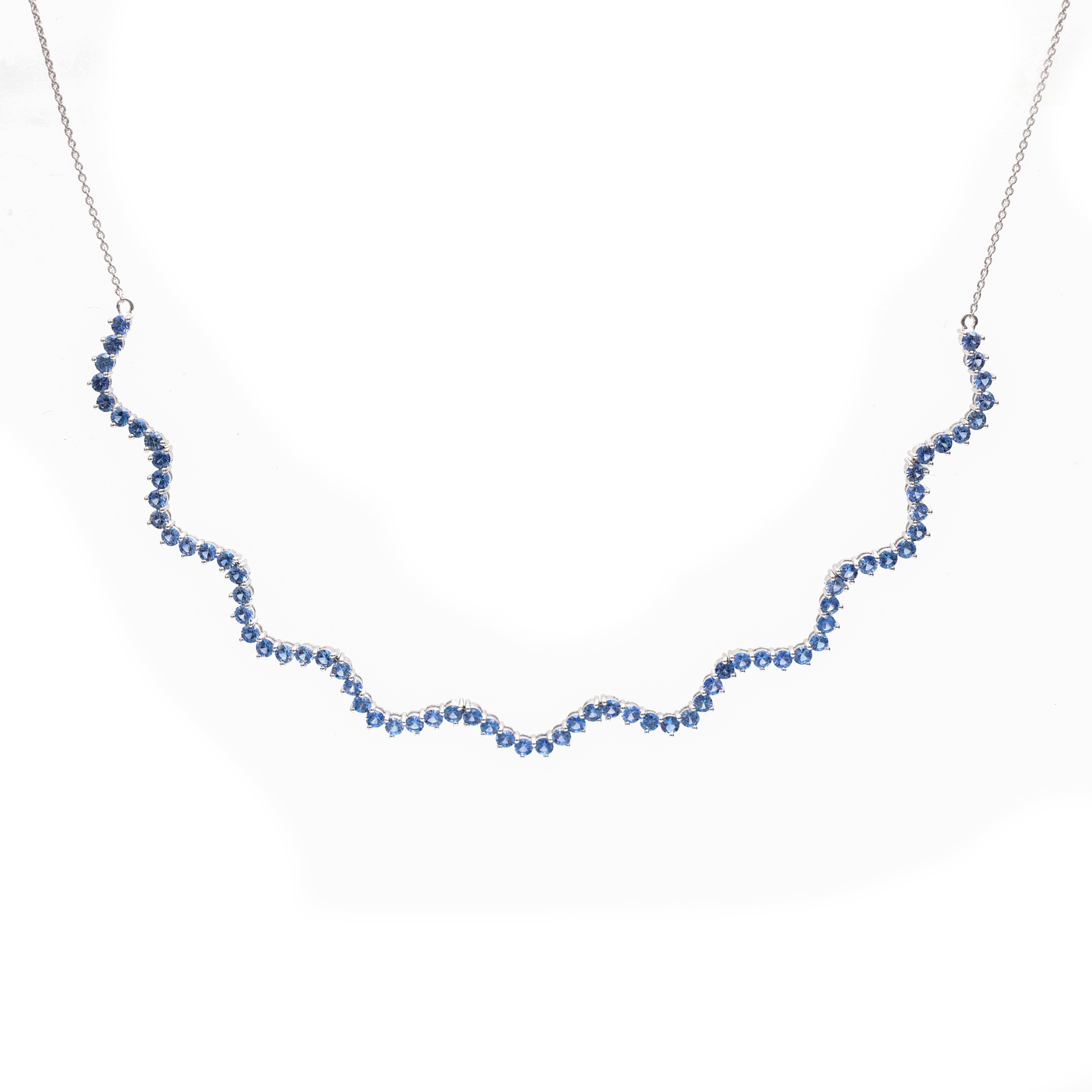JPNC-702/9001 Blue Sapphire Round Wave Necklace | 18K